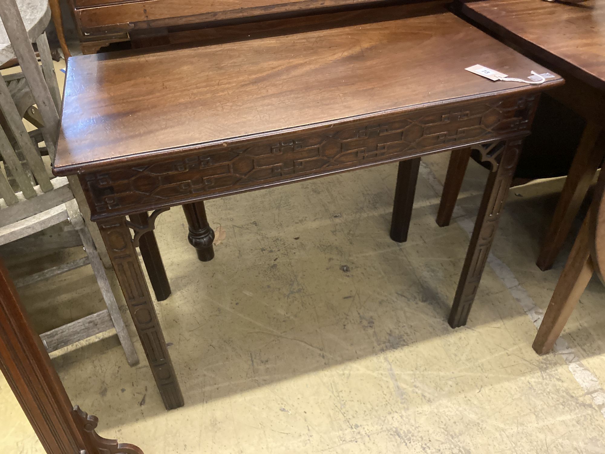 A Chippendale style side table, width 86cm, depth 44cm, height 71cm